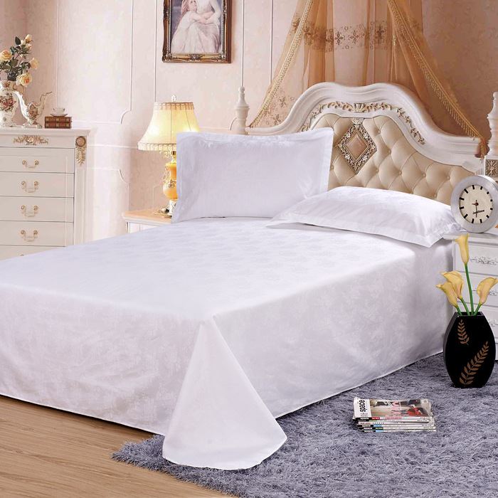Drap plat brodé